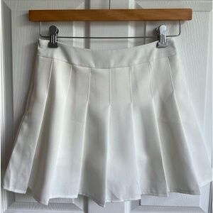 White pleated skirt, built in shorts under skirt, like new condition